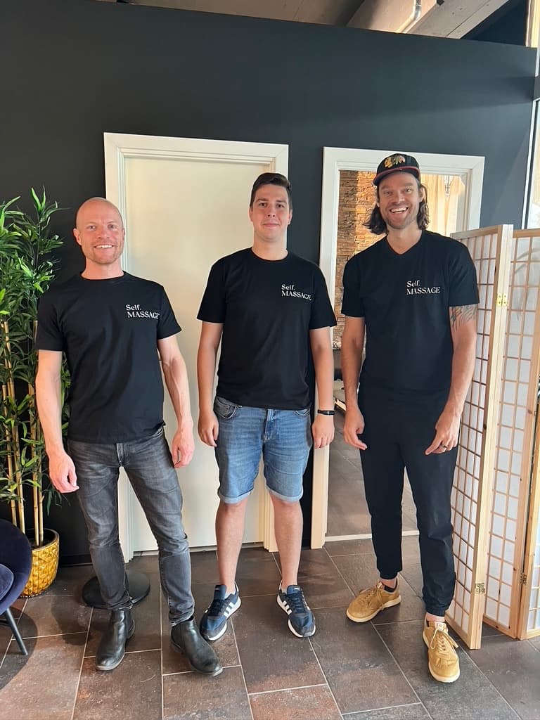 Julian and Jimmy Jorgensen and prototype massage robot