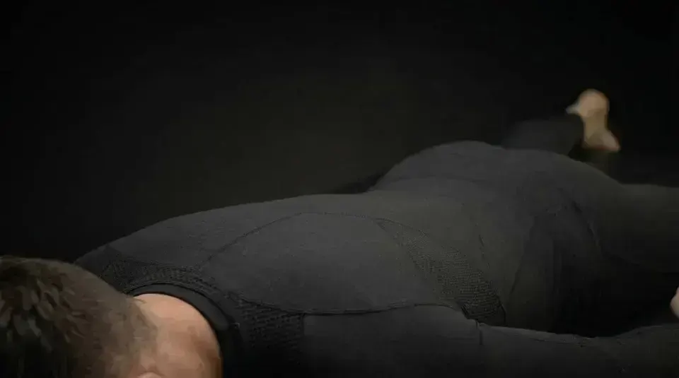 A guest lying face-down, ready for a Self recovery session